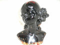 Buste femme et sa coiffure de fleur